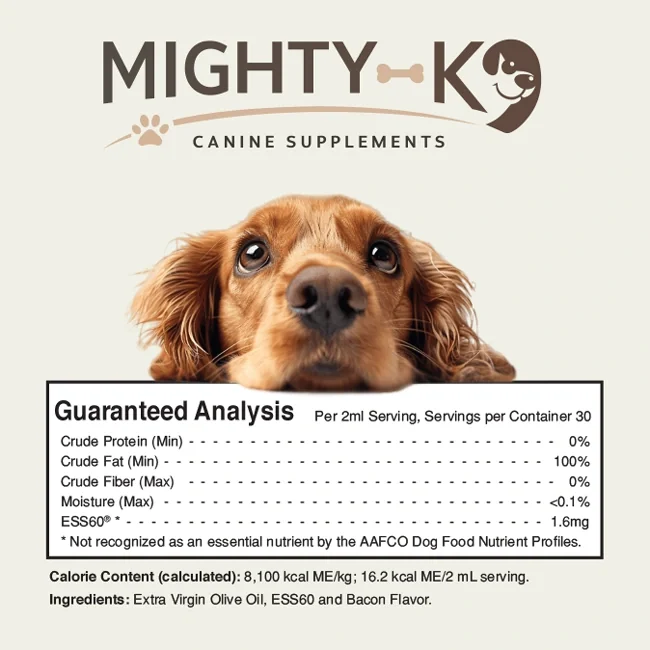 The Mighty K9 Guaranteed Analysis label: per 2 mL serving, crude protein 0%, crude fat 100%, fiber 0%, moisture under 0.1%, ESS60 1.6 mg, 16.2 kcal per serving
